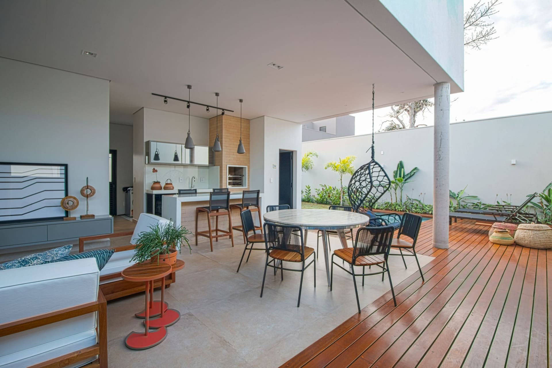 The finished open-plan living and dining space opening to the garden